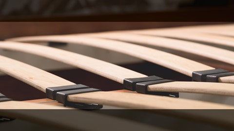 Een close-up van een houten lat