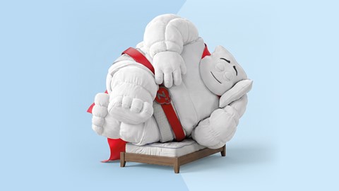 een knuffeldier op een bed