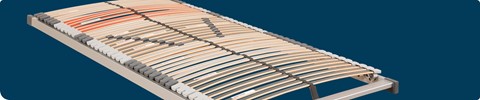 Een close-up van een bedframe