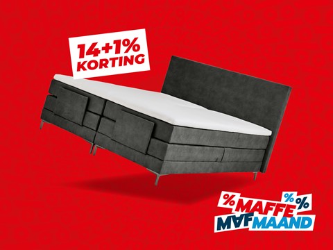 een bed met een witte matras