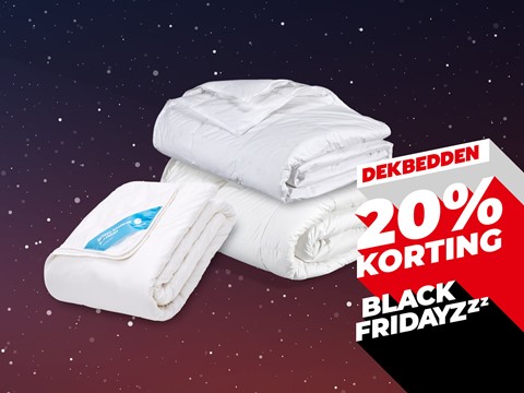 een stapel dekens op een zwarte achtergrond
