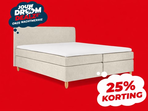 een bed met een witte matras