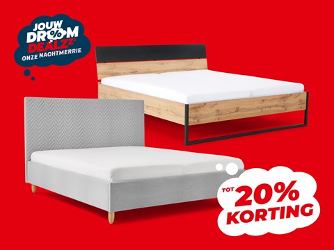 een bed met een hoofdeinde en matras
