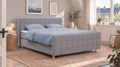 Een bed in een kamer