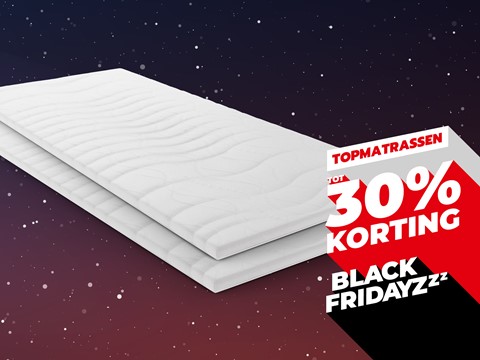 Een wit matras op een zwarte achtergrond