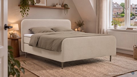Een bed in een kamer